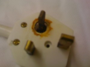 A little burnt plug, remover from a heater left running in an office in Estate agents office Milton Keynes
